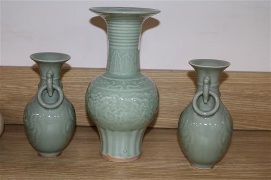 A group of Chinese celadon glazed porcelain vases and two dishes tallest vase 25cm